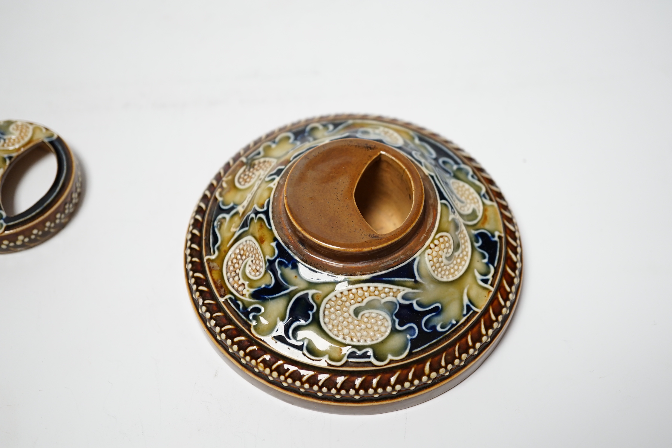 A Doulton Lambeth stoneware inkwell by Mark V. Marshall, 12cm diameter